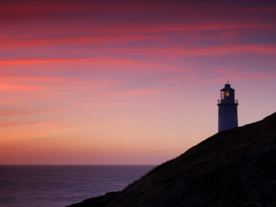 Trevose Lighthouse At Sunset, Near Padstow, Cornwall, Uk. July 2008 by Ross Hoddinott Pricing Limited Edition Print image