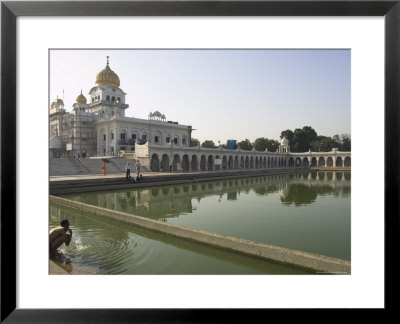 Sikh Pilgrim Bathing In The Pool Of The Gurudwara Bangla Sahib Temple, Delhi, India by Eitan Simanor Pricing Limited Edition Print image