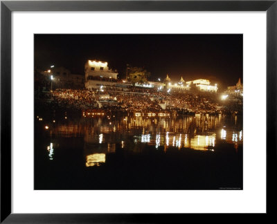 Hindus Line The Ghat At Night To Float Candles Down The River by James P. Blair Pricing Limited Edition Print image