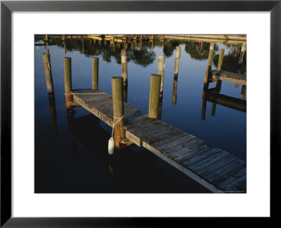 Boat Slips At A Marina On A Calm Morning by Raul Touzon Pricing Limited Edition Print image