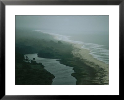 Elevated View Of Fog-Shrouded Atlantic Coast Of Gabon by Michael Nichols Pricing Limited Edition Print image