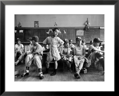 Boys Club Little League Baseball Players Putting On Their Uniforms Prior To Playing Game by Yale Joel Pricing Limited Edition Print image