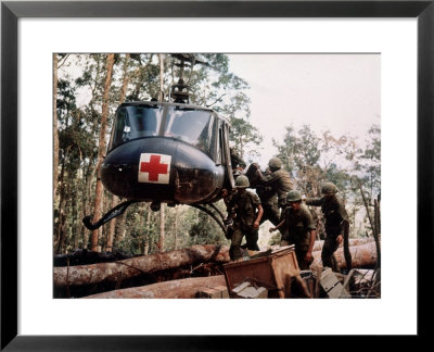 American 4Th Battalion, 173Rd Airborne Brigade Soldiers Loading Wounded Onto A Huey Helicopter by Alfred Batungbacal Pricing Limited Edition Print image