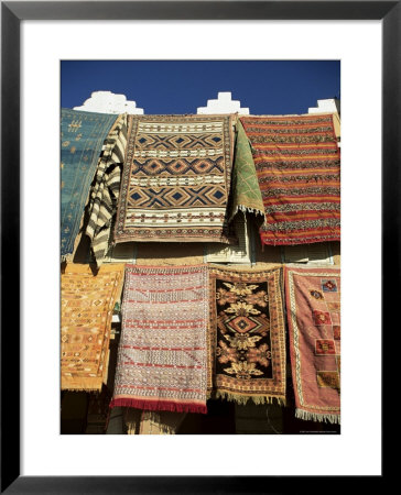 Carpets For Sale Outside Shop In Frontier Town Of Agdz, Morocco, North Africa, Africa by Lee Frost Pricing Limited Edition Print image