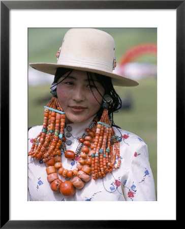 Portrait Of A Tibetan Woman Wearing Jewellery Near Maqen, Qinghai Province, China by Occidor Ltd Pricing Limited Edition Print image