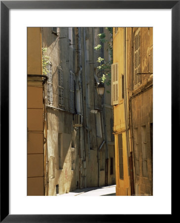 Narrow Sunlit Street In Old Aix, Provence-Alpes-Cote-D'azur, France by Ruth Tomlinson Pricing Limited Edition Print image