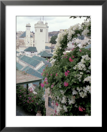 Green-Tiled Roof And Minaret In The Medina, Fes, Morocco by John & Lisa Merrill Pricing Limited Edition Print image