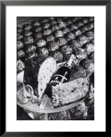 Pannetone, A Bottle Of Champagne And A Glass Sitting On A Platter by A. Villani Pricing Limited Edition Print image