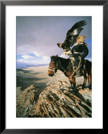 Hunter On Horseback Atop A Hill Holding A Golden Eagle In Mongolia by David Edwards Pricing Limited Edition Print image