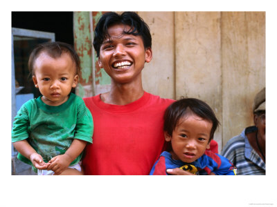 Portrait Of Man With Children At Sunda Kelapa, Jakarta, Indonesia by Tom Cockrem Pricing Limited Edition Print image