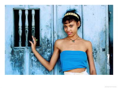Cuban Girl Posing Beside Door Of Colonial Home, Santiago De Cuba, Cuba by Christopher P Baker Pricing Limited Edition Print image