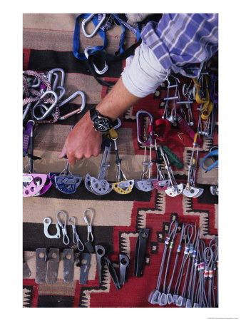 A Rock Climber Sorts Gear For A Climb by Bill Hatcher Pricing Limited Edition Print image