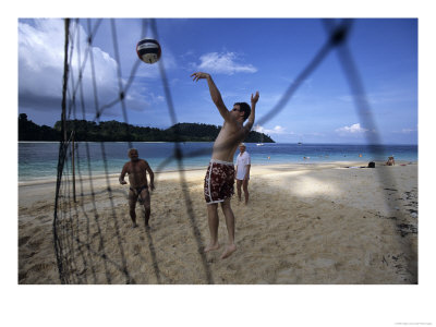 Men Playing Beach Volleyball On Ko Khai Nok Beach, Thailand by Holger Leue Pricing Limited Edition Print image