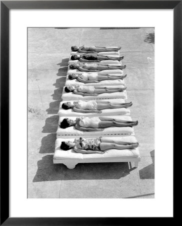 Fashion Models Wearing Swimsuits At A Florida Pool by Lisa Larsen Pricing Limited Edition Print image