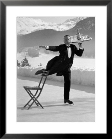 Waiter Rene Brequet With Tray Of Cocktails As He Skates Around Serving Patrons At The Grand Hotel by Alfred Eisenstaedt Pricing Limited Edition Print image