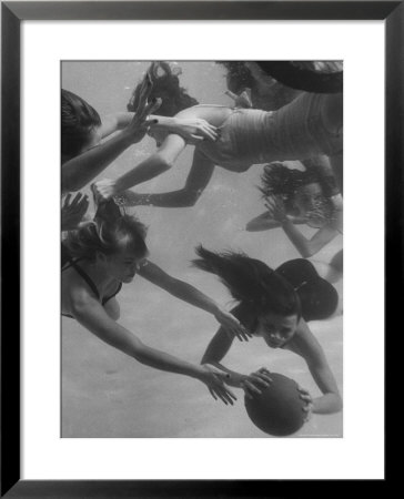 Girl Getting Her Hair Pulled As Swimmers Play A Fast Scrimmage Of Water Polo At Athletic Club by Peter Stackpole Pricing Limited Edition Print image