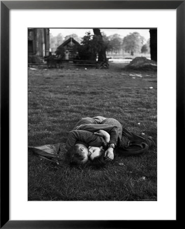 American Soldier Kissing English Girlfriend On Lawn In Hyde Park, Favorite Haunts Of Us Troops by Ralph Morse Pricing Limited Edition Print image