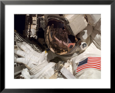 Sts-117 Mission Specialists Astronauts Resuming Construction On The Iss by Stocktrek Images Pricing Limited Edition Print image
