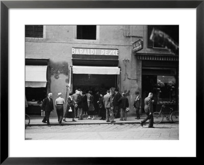 Few Clients At The Entrance Of The Baraldi Fish Shop, In Via Orefici, Bologna by A. Villani Pricing Limited Edition Print image