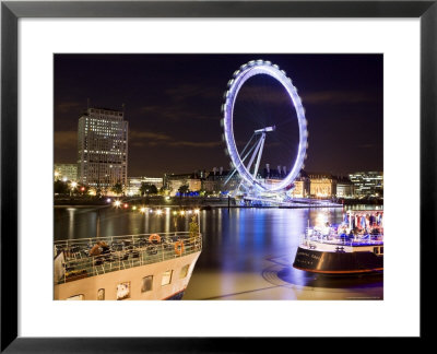 Blurred London Eye Reflected In The Thames At Night With Floating Restaurants In The Foreground by Orien Harvey Pricing Limited Edition Print image