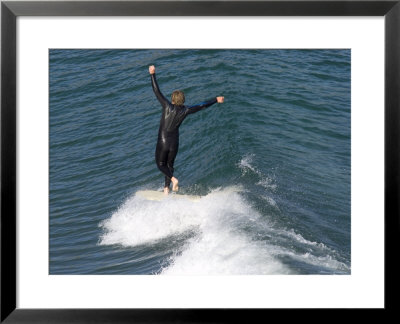Man Surfs A Longboard At Refugio Point, California by Rich Reid Pricing Limited Edition Print image