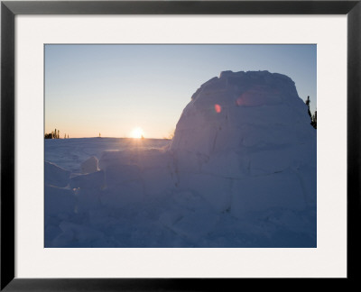 Sun Shines Over The Horizon And An Igloo In Svalbard, Norway by Norbert Rosing Pricing Limited Edition Print image