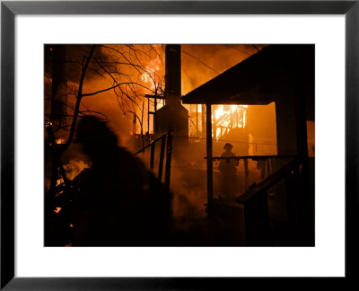Firefighters Spray Down A Burning House In Running Springs by Mark Thiessen Pricing Limited Edition Print image
