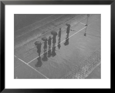 Overhead View Of People With Umbrellas Waiting For The Tram, Melbourne, Australia by E O Hoppe Pricing Limited Edition Print image