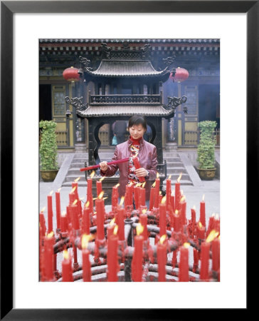 Woman With Candle And Incense Offerings, Big Goose Pagoda Temple, Xian, Shaanxi Province, China by Gavin Hellier Pricing Limited Edition Print image