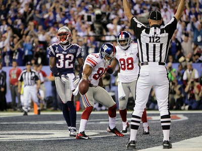 New York Giants And New England Patriots - Super Bowl Xlvi - February 5, 2012: Victor Cruz by Ben Liebenberg Pricing Limited Edition Print image