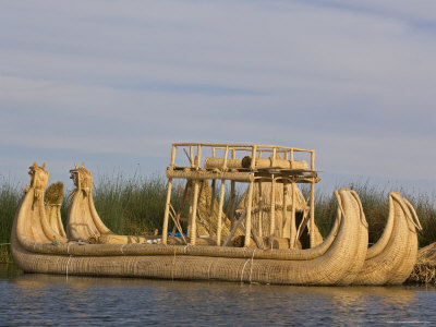 Totora Reed Boats Used By Inhabitants Of The Floating Islands, Islas De Los Uros, Lake Titicaca by Dennis Kirkland Pricing Limited Edition Print image