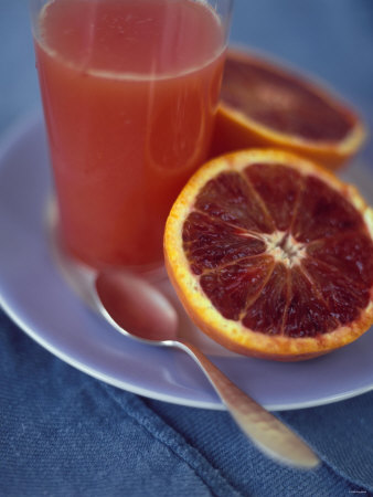 Halved Blood Orange With A Glass Of Blood Orange Juice by David Loftus Pricing Limited Edition Print image