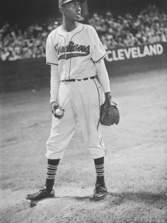 Baseball Player Satchel Paige Looking Towards The Ball Field While Standing In The Bull Pen by George Silk Pricing Limited Edition Print image