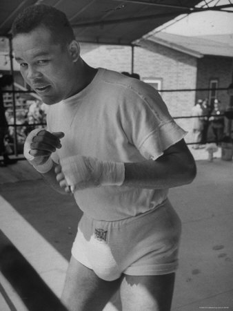 Boxer Joe Louis During Training Session In Preparation For Rematch With Jersey Joe Walcott by Tony Linck Pricing Limited Edition Print image