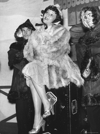 Actress And Singer Mary Martin Sitting On A Trunk As She Begins To Sing In A Broadway Musical by Alfred Eisenstaedt Pricing Limited Edition Print image