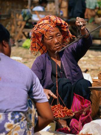 Woman Weighing Chillies At Market, Shwenyaung, Shan State, Myanmar (Burma) by Bernard Napthine Pricing Limited Edition Print image
