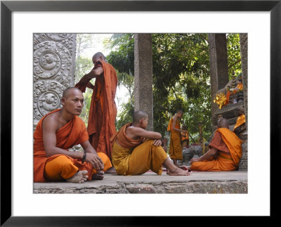 Buddhist Monks Relaxing Amongst The Temples Of Angkor, Cambodia, Indochina, Southeast Asia by Andrew Mcconnell Pricing Limited Edition Print image