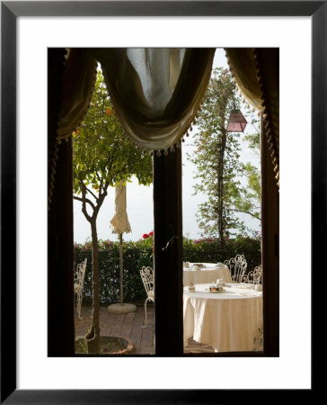 View Of Balcony Tables, San Domenico Palace Hotel, Taormina, Sicily, Italy by Walter Bibikow Pricing Limited Edition Print image