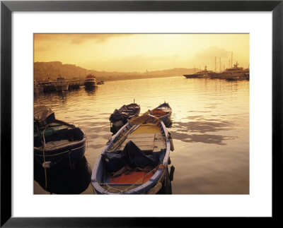 Sunset Setting Over Two Boats At A Fishing Harbour And Marina On The Bay Of Naples In Naples, Italy by Richard Nowitz Pricing Limited Edition Print image