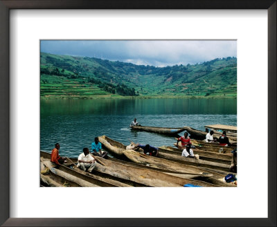 Villagers In Dugout Canoes At Market, Lake Bunyonyi, Kabale, Uganda by Ariadne Van Zandbergen Pricing Limited Edition Print image