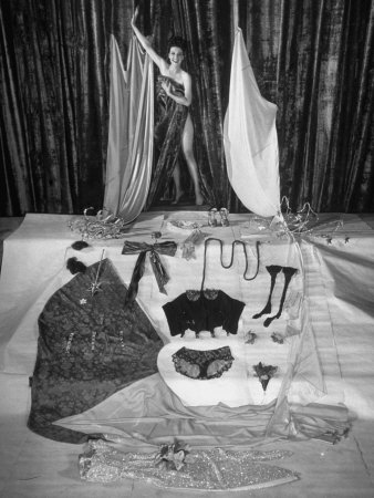 Gypsy Rose Lee Posing For Photographer, With Costumes Displayed She Uses While Performing by George Skadding Pricing Limited Edition Print image