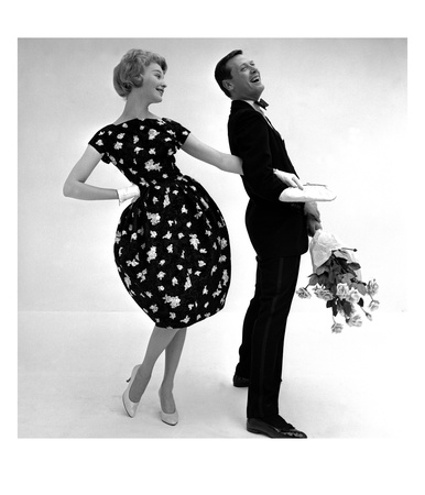 Model Wearing A Puff Ball Skirt And Escort With Roses, 1958 by John French Pricing Limited Edition Print image