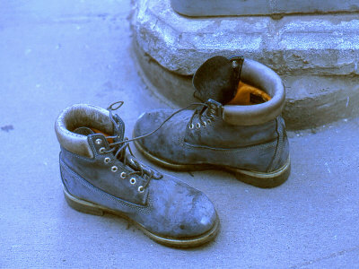 Pair Of Boots Left By Ground Zero Site, New York City by Images Monsoon Pricing Limited Edition Print image