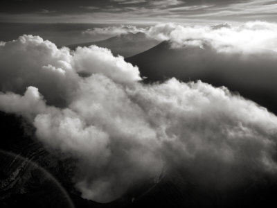 Aerial View Of Clouds Partially Obscuring Ambrym Volcano by Stephen Alvarez Pricing Limited Edition Print image