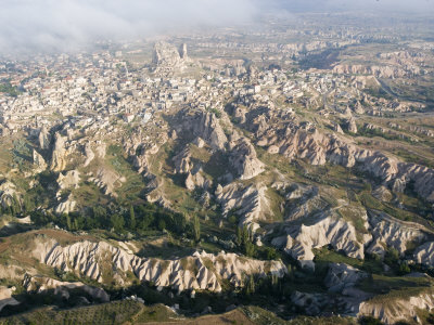 Aerial View Of Mountain Valley And Village From Hot Air Balloon by Scott Stulberg Pricing Limited Edition Print image