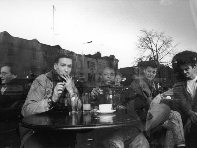 Drinkers Reflected In A Camden Pub Window by Shirley Baker Pricing Limited Edition Print image