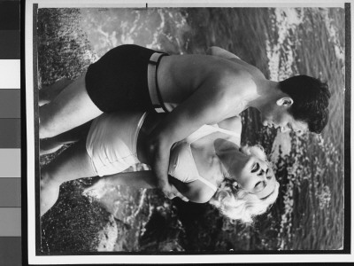 John Garfield And Lana Turner Embrace On Laguna Beach In The Postman Always Rings Twice by Walter Sanders Pricing Limited Edition Print image