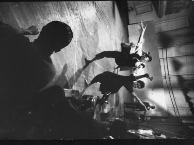 Choreographer Geoffrey Holder Dancing With Unidentified Female Dancer As Others Watch by Gjon Mili Pricing Limited Edition Print image