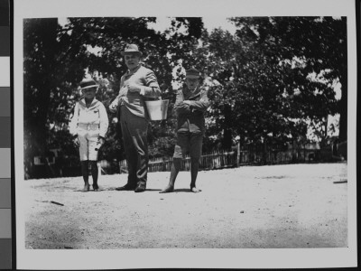 Mr. Otis Wattles With Two Well-Dressed Boys At The Fair Residence by Wallace G. Levison Pricing Limited Edition Print image