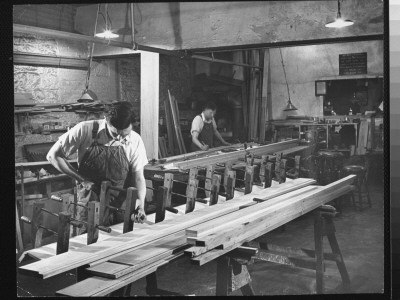 Men At Work In Carpentry Show In New York Public Library by Alfred Eisenstaedt Pricing Limited Edition Print image